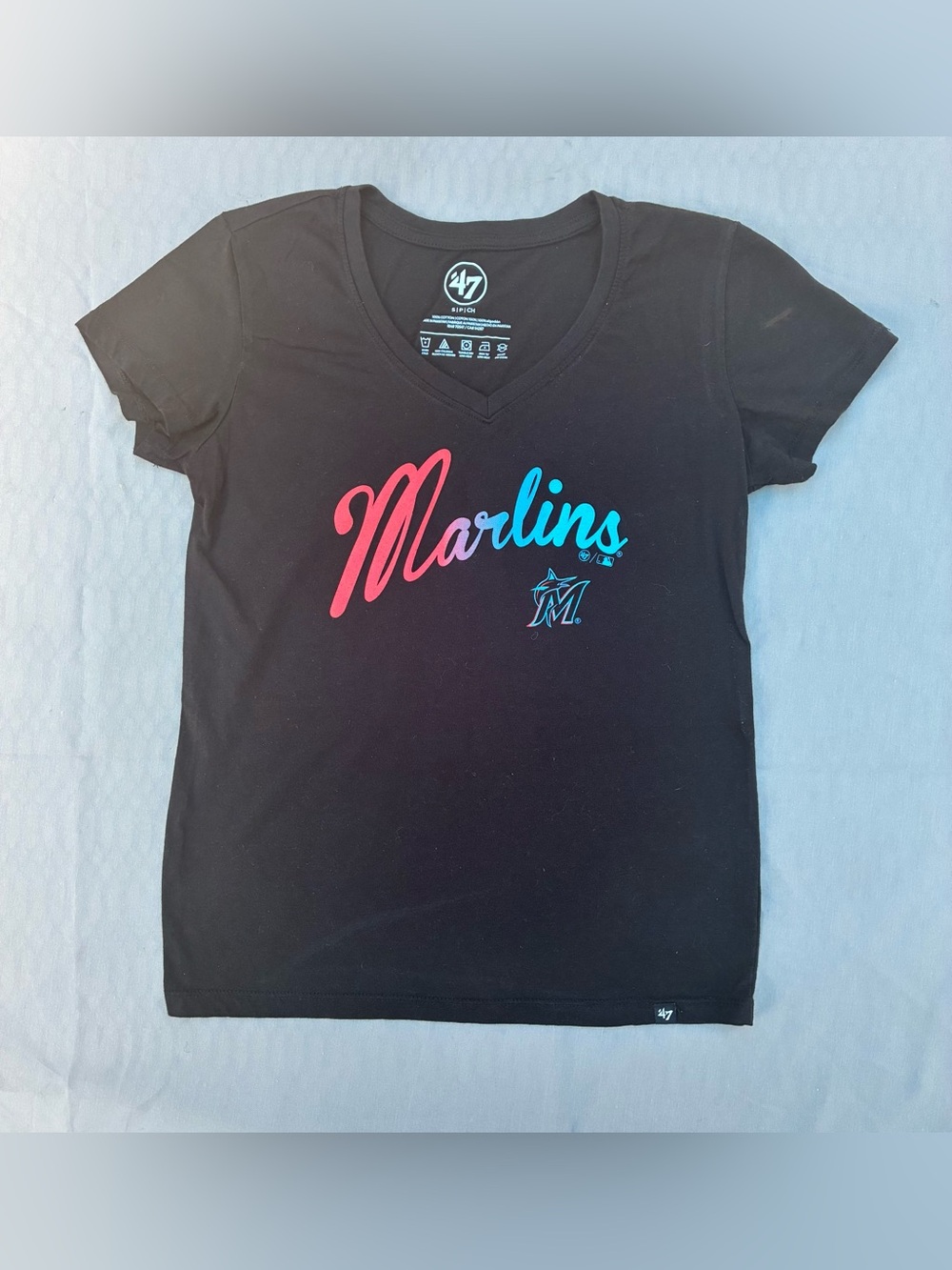 ’47 Marlins V-Neck Tee in Black with Red-to-Blue Script